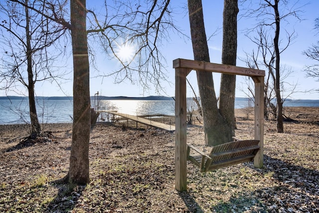 exterior space with a water view