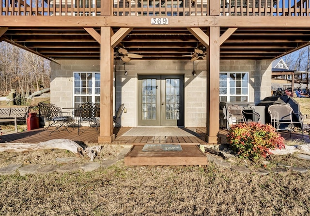 doorway to property with french doors and a deck