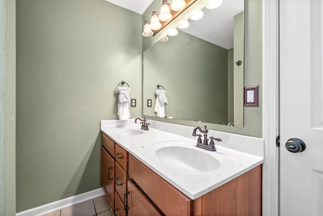 bathroom with tile patterned flooring and vanity