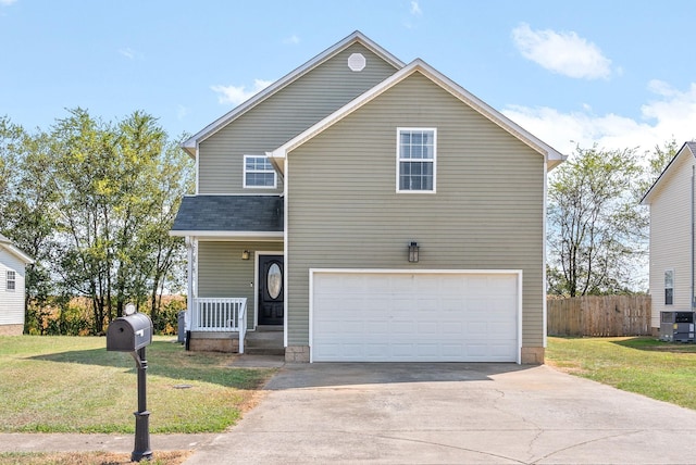 front of property featuring central AC, a front yard, and a garage