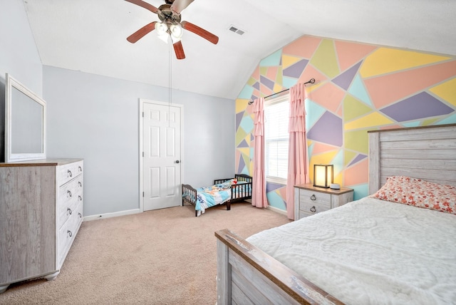 carpeted bedroom featuring ceiling fan and lofted ceiling