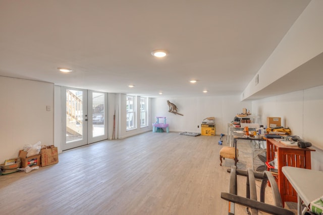 interior space featuring french doors and light wood-type flooring