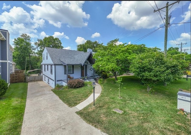 view of front of home with a front yard