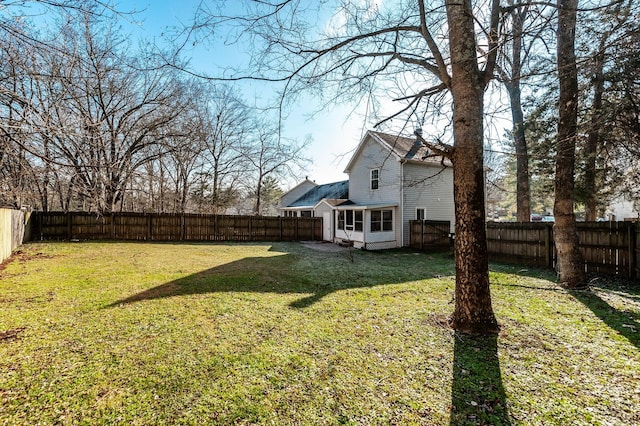 view of yard with a sunroom