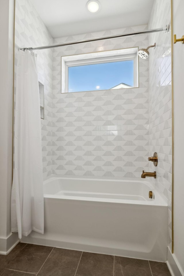 bathroom featuring tile patterned floors and shower / bath combination with curtain