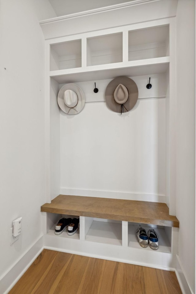 mudroom with hardwood / wood-style floors