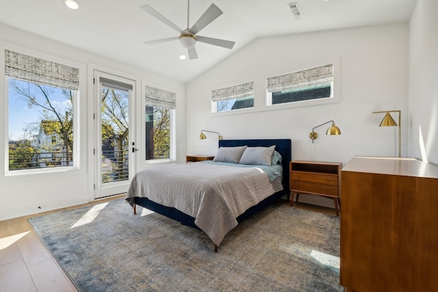 bedroom with ceiling fan, lofted ceiling, and access to outside