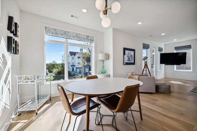 dining space featuring light hardwood / wood-style floors