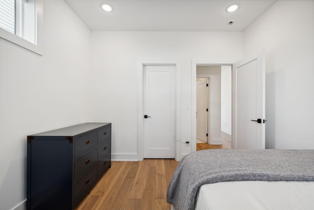 bedroom featuring light wood-type flooring