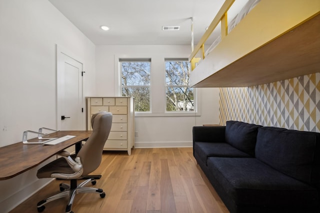 home office featuring light hardwood / wood-style floors