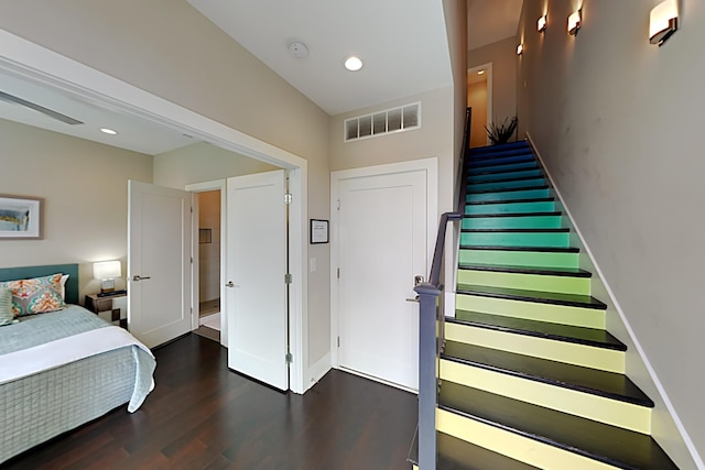 staircase featuring hardwood / wood-style flooring