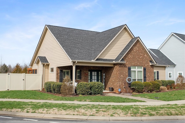 view of front of home featuring a front lawn