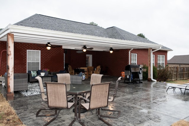 view of patio / terrace featuring ceiling fan and grilling area