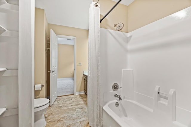 full bathroom featuring shower / tub combo with curtain, vanity, and toilet