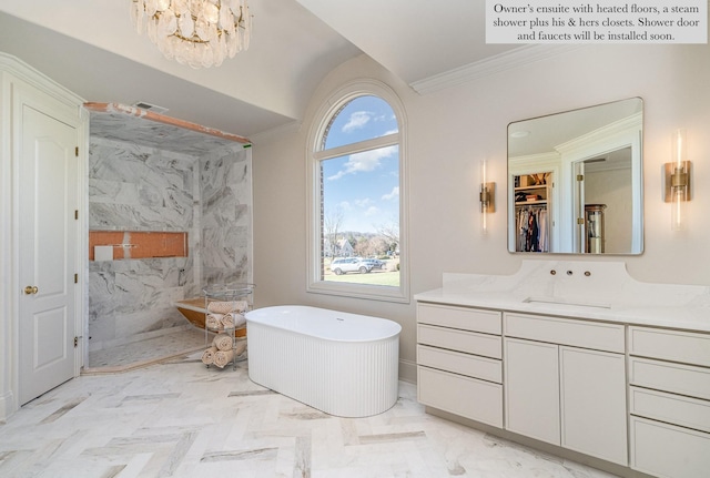 bathroom with independent shower and bath, vanity, crown molding, and a chandelier