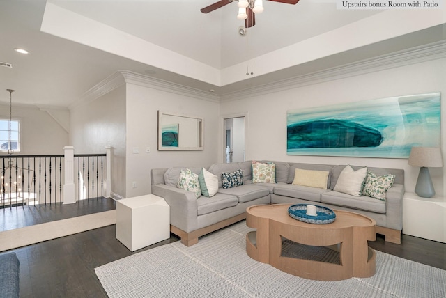 living room featuring ceiling fan, crown molding, and wood-type flooring