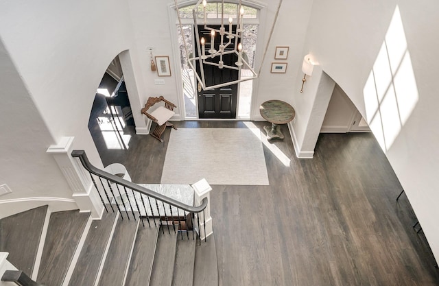 foyer entrance with dark wood-type flooring