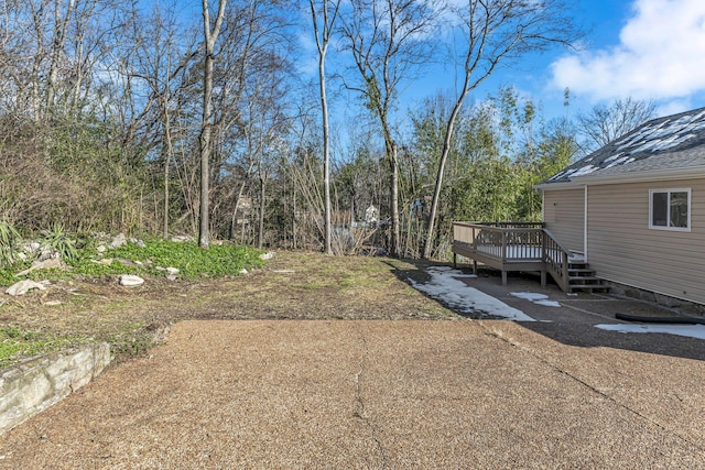 view of yard with a deck