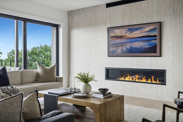 living room featuring a healthy amount of sunlight and wood-type flooring