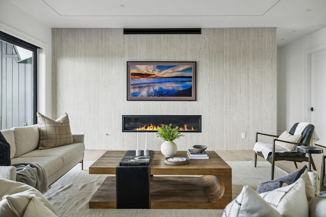 living room featuring wood walls