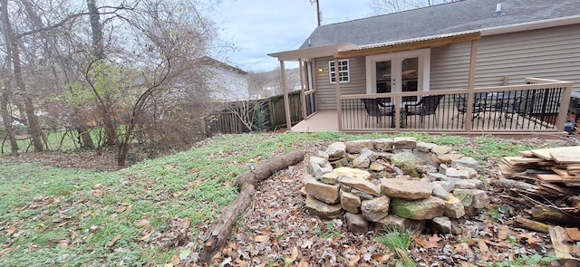 view of yard featuring french doors