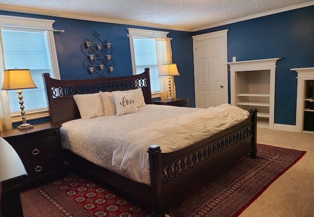 bedroom featuring carpet flooring, crown molding, and a textured ceiling