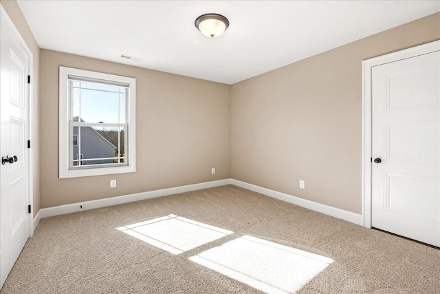 empty room featuring carpet