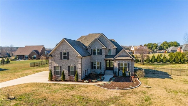 craftsman house with a front yard