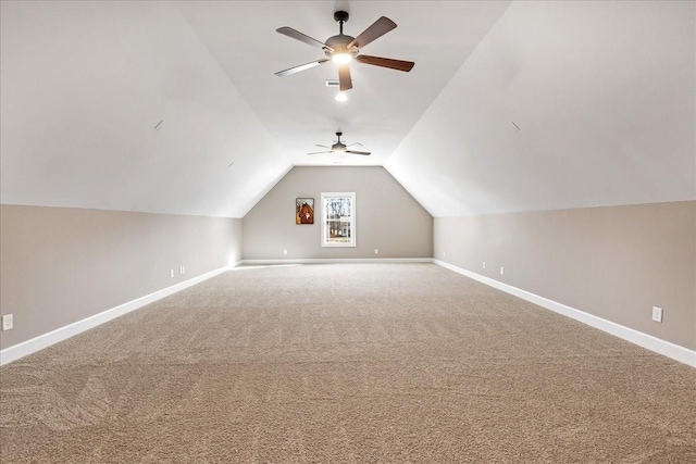 bonus room featuring carpet flooring, ceiling fan, and vaulted ceiling