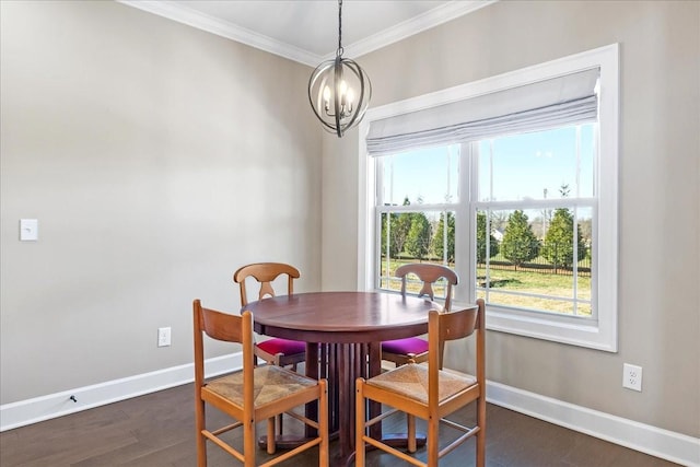 dining space with a notable chandelier, dark hardwood / wood-style flooring, and ornamental molding