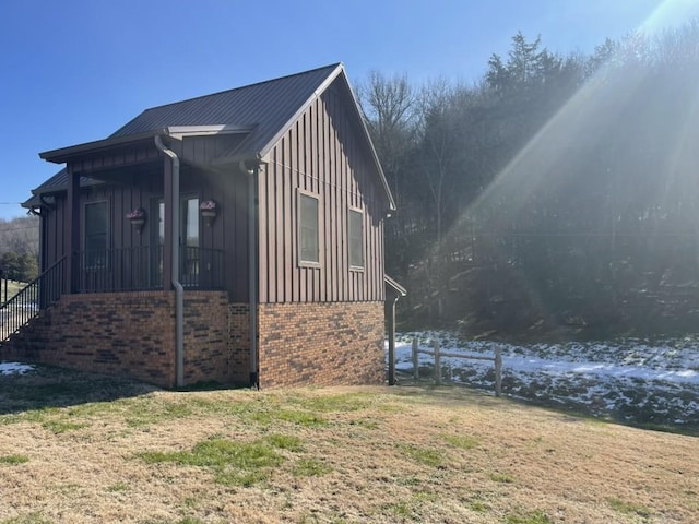 view of home's exterior with a lawn