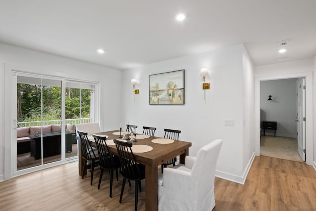 dining space featuring light hardwood / wood-style flooring