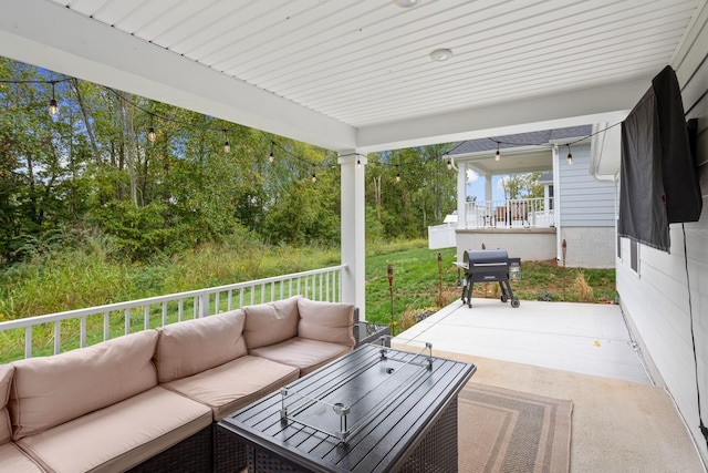 view of patio featuring an outdoor hangout area and grilling area