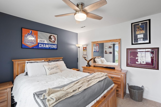 carpeted bedroom featuring ceiling fan