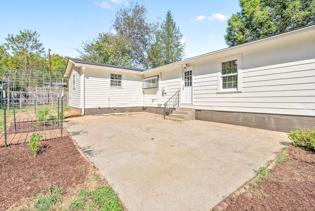 rear view of house with a patio area