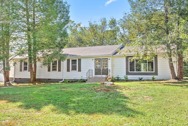 ranch-style home with a front lawn