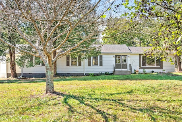 single story home with a front yard