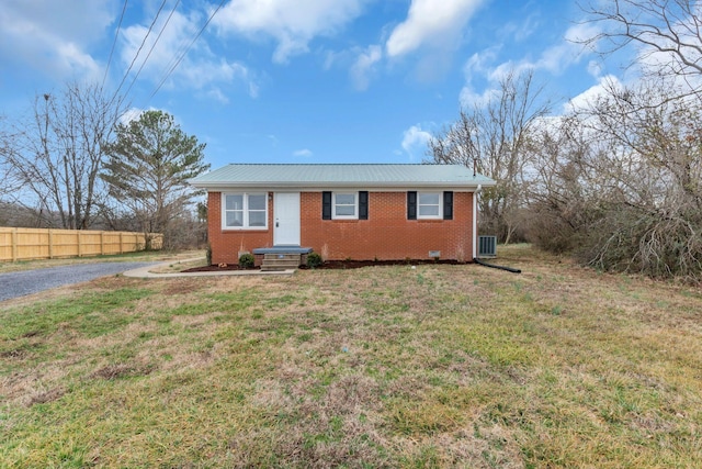 ranch-style home with a front yard