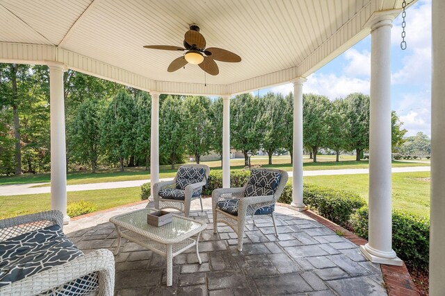 view of patio / terrace featuring ceiling fan