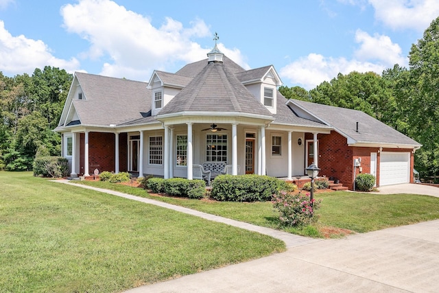 view of front facade featuring ceiling fan, a front lawn, covered porch, and a garage