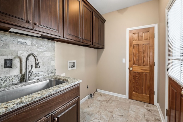 laundry room with cabinets, washer hookup, electric dryer hookup, and sink