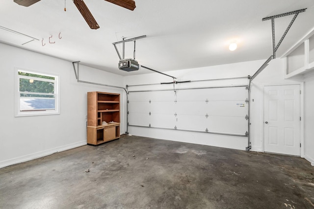 garage featuring ceiling fan and a garage door opener