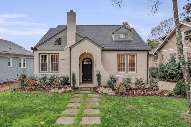 view of front of home with a front yard