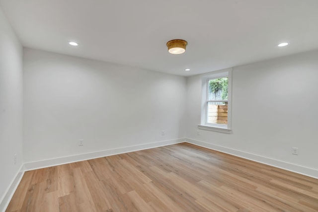 unfurnished room featuring light hardwood / wood-style flooring