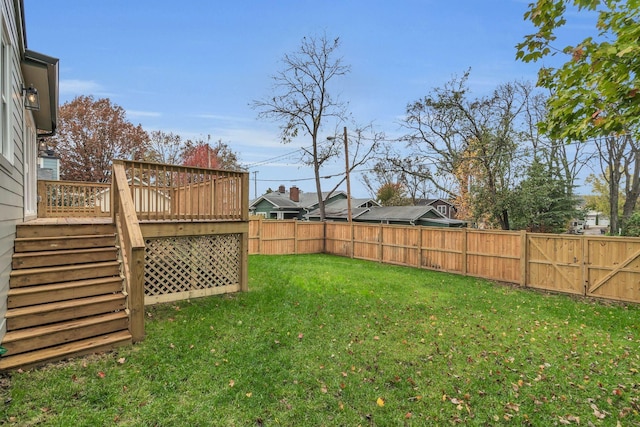 view of yard with a deck