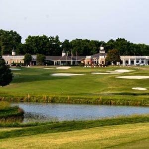 surrounding community with a yard and a water view