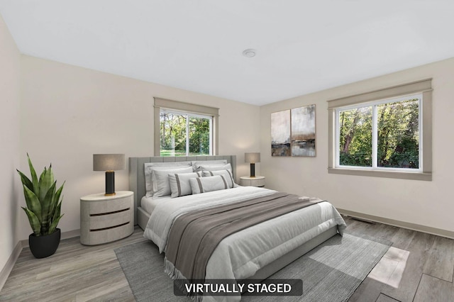 bedroom featuring light hardwood / wood-style flooring