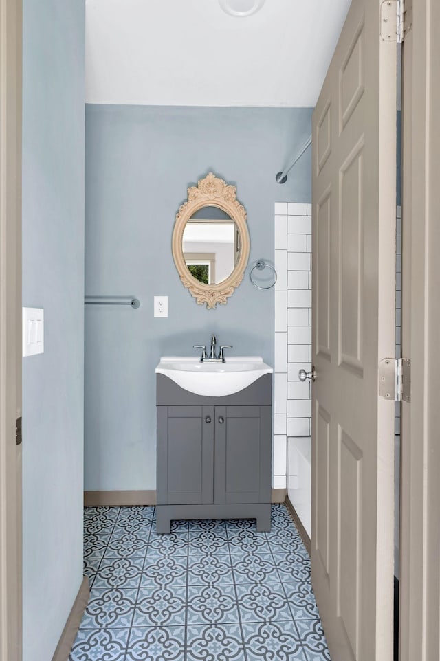 bathroom with shower / tub combination and vanity