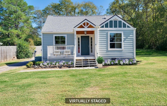 view of front of home featuring a front yard