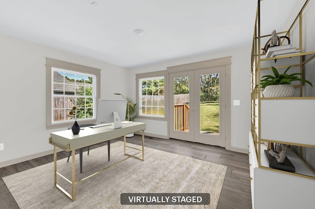 office space featuring dark hardwood / wood-style flooring and french doors